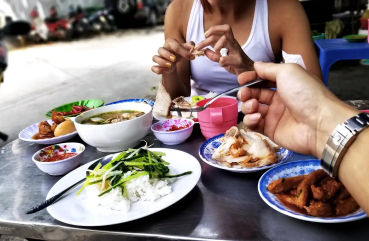 Saigon at Night: Street Food by Motorbike Tour